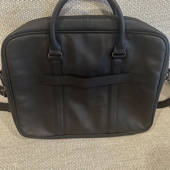 Black Leather Briefcase with Pebbled Texture and Structured Design